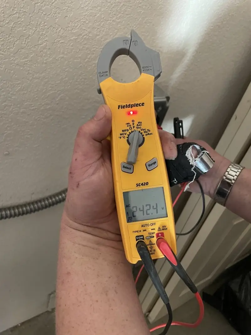 Voltage testing with clamp meter during Aluminum Wiring Replacement in Wayland